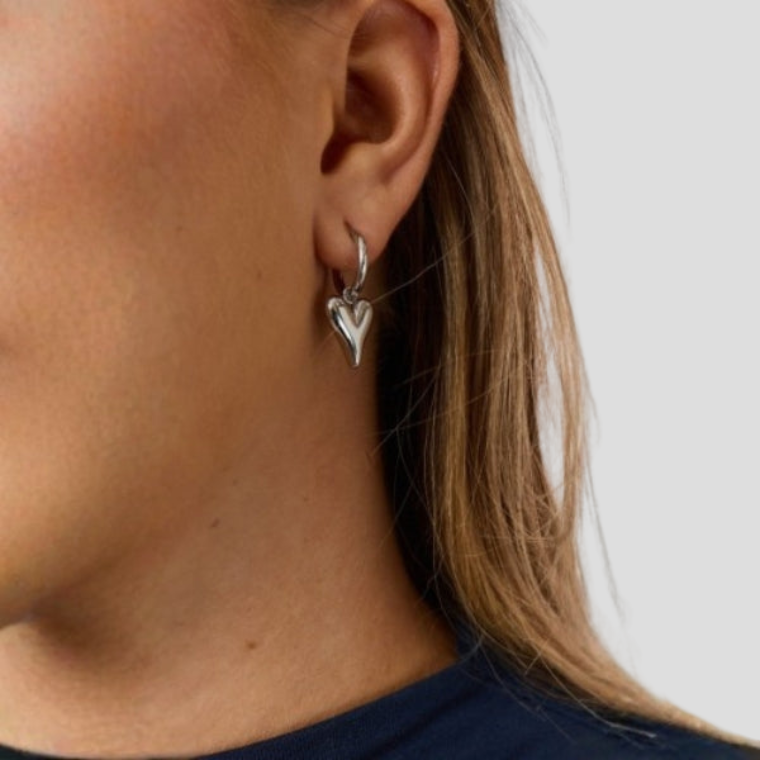 Women Earring | Sculpted Heart Shape & Polished Silver Finish for Daily Wear