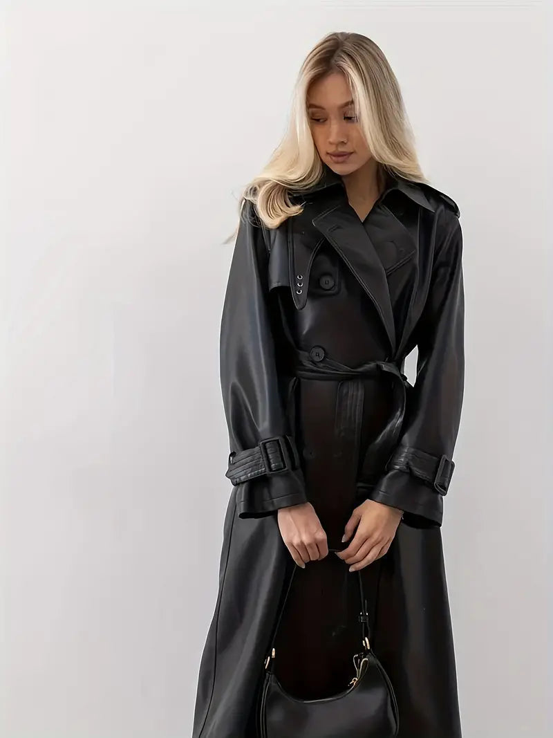 Women's long black faux leather belted trench coat, elongated statement silhouette