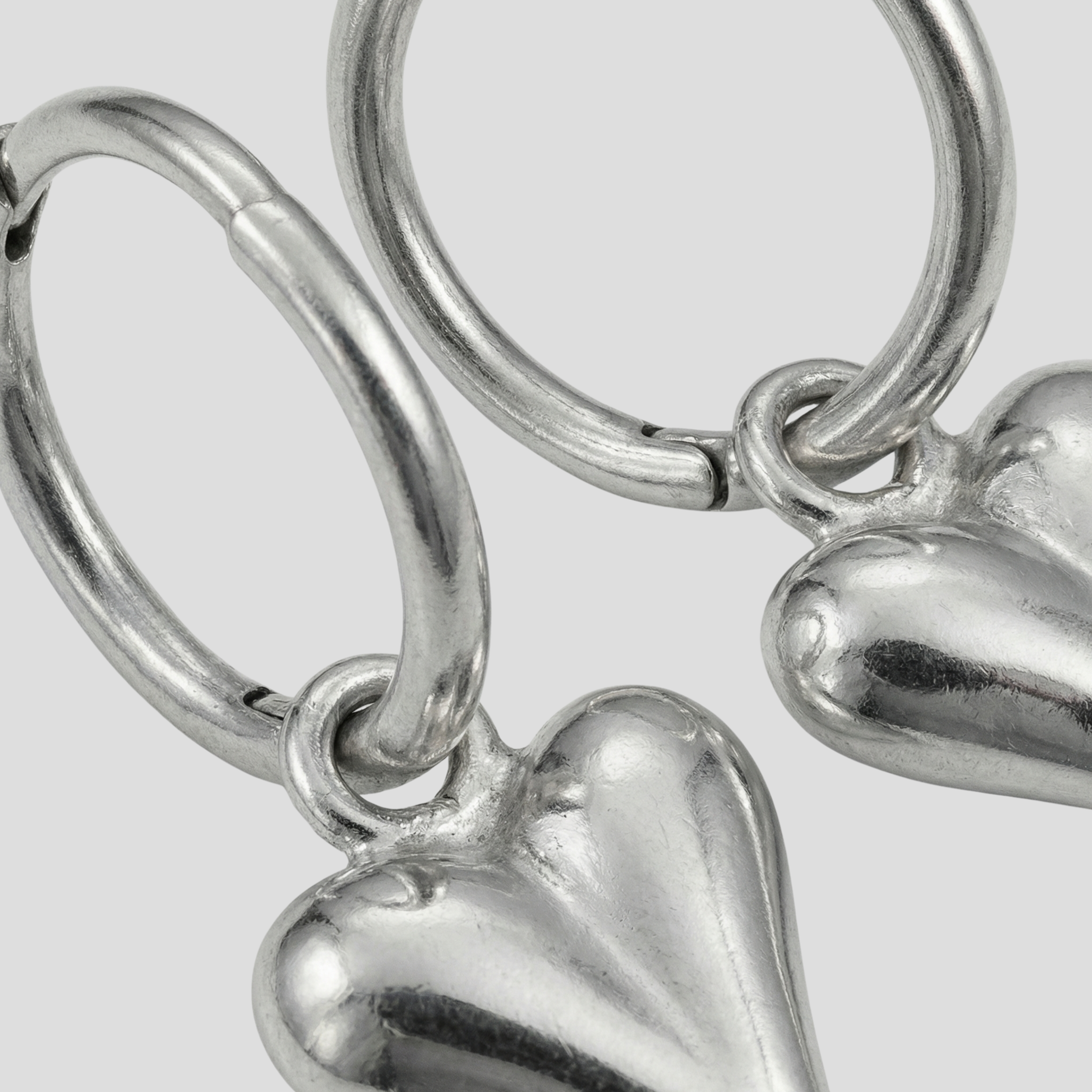 Women Earring | Sculpted Heart Shape & Polished Silver Finish for Daily Wear