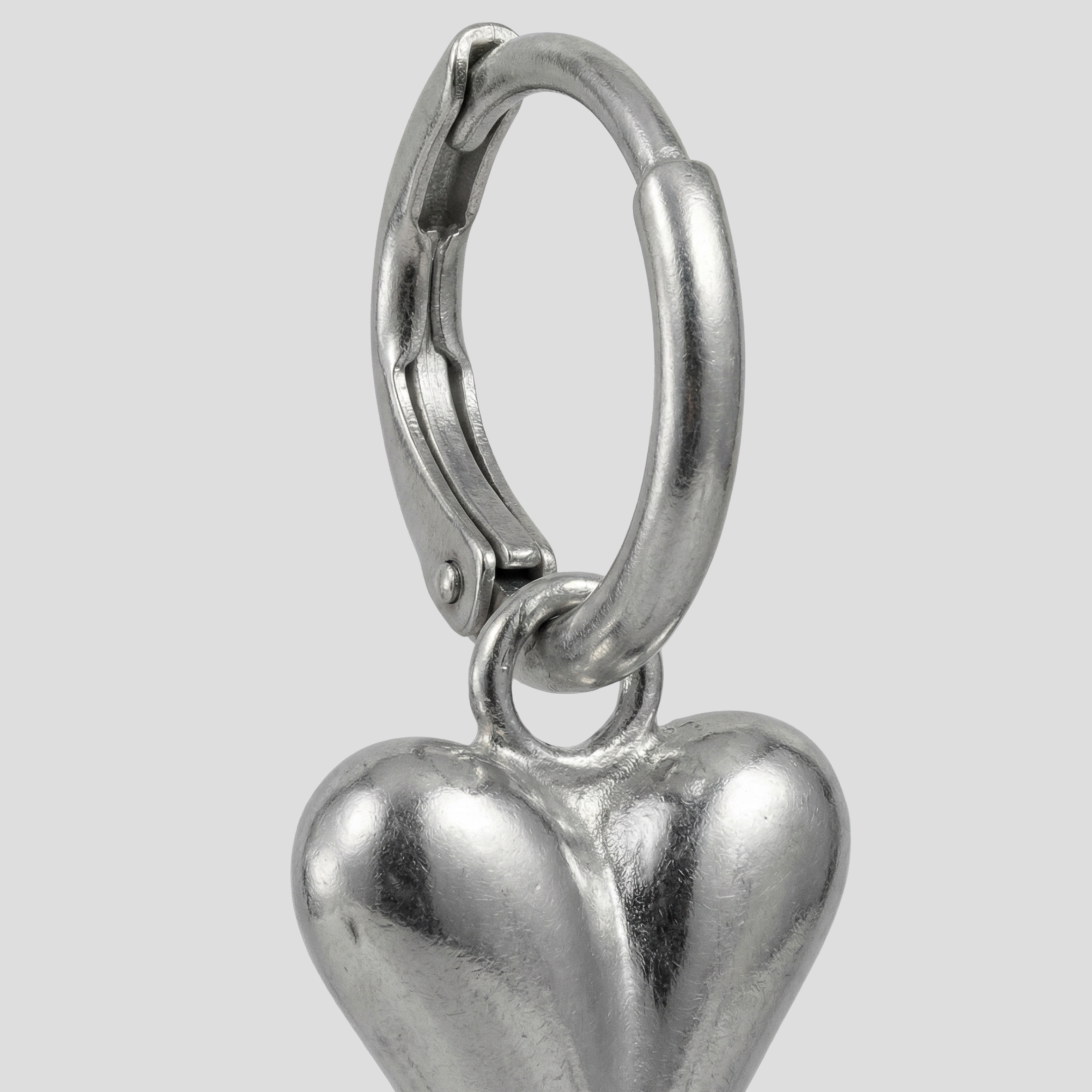 Women Earring | Sculpted Heart Shape & Polished Silver Finish for Daily Wear