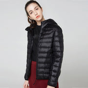 Women's shiny quilted short puffer jacket with zip-up front in multiple colours
