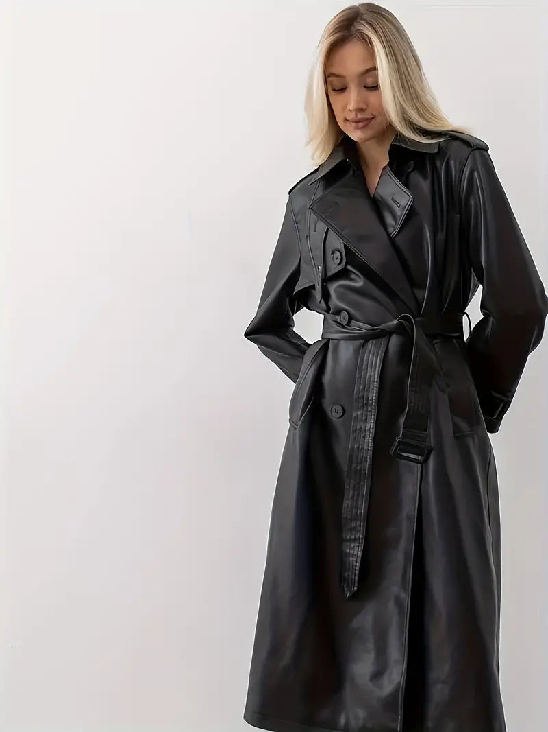 Women's long black faux leather belted trench coat, elongated statement silhouette