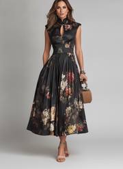 Black floral A-line midi dress with mandarin collar, keyhole neckline and cap sleeves